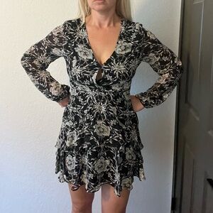 Flowy black floral boutique dress, tie back